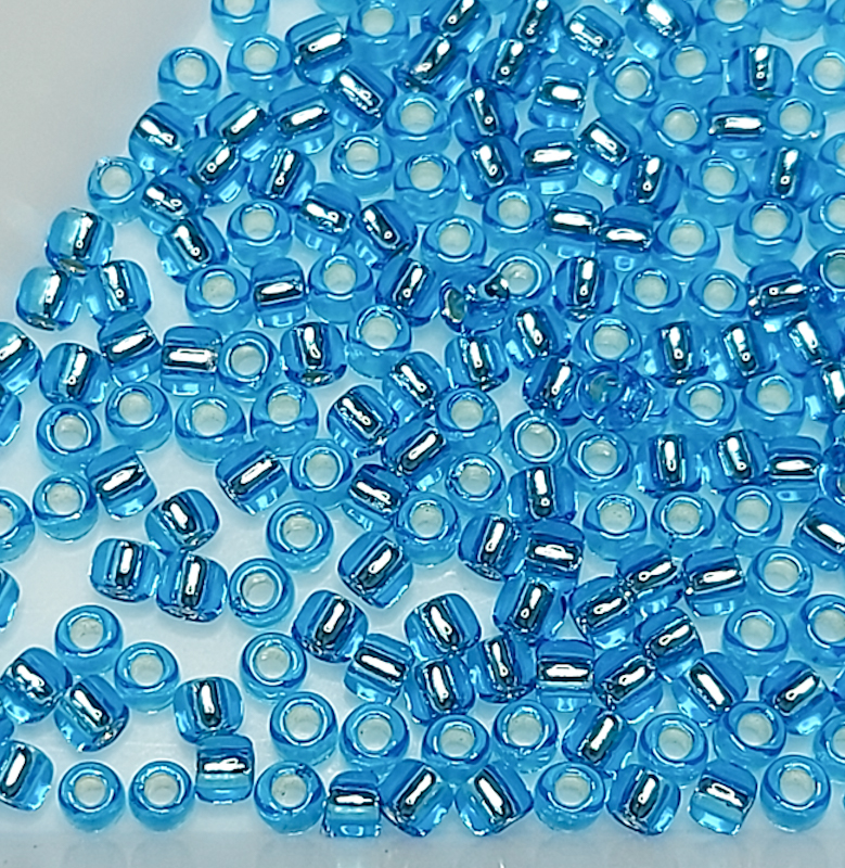 Бісер 5г TOHO Round 11/0 Silver-Lined Dk Aqua TR-11-23B