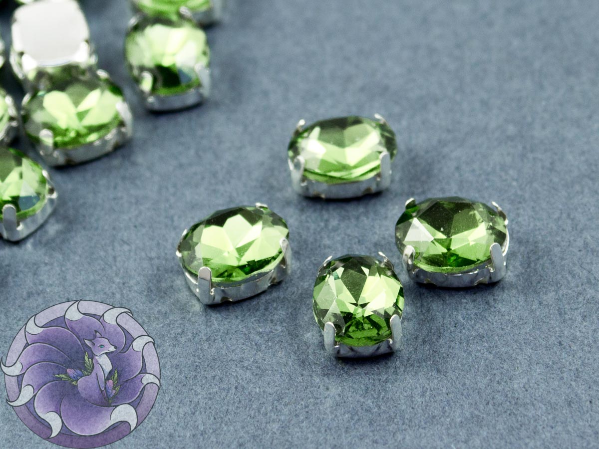 Кристал у срібній оправі Овал 10x8мм Peridot
