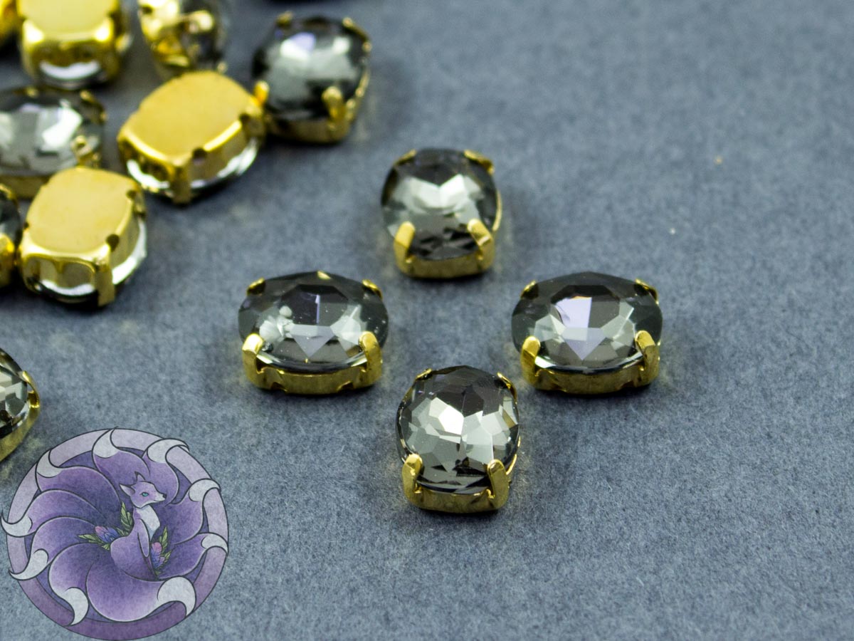 Кристал у золотій оправі Овал 10x8мм Black Diamons