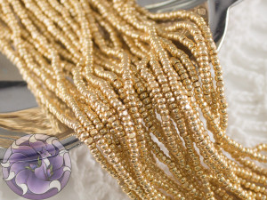 Бісер шарлотка 13/0 на нитці Opaque Metallic Gold