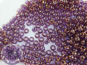 Бісер 5г TOHO Round 11/0 Gold-Lustered Lt Amethyst TR-11-203