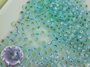 Бісер 5г TOHO Round 11/0 PermaFinish - Silver-Lined Milky Lt Aqua TR-11-PF2116