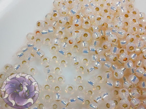 Бісер 5г TOHO Round 11/0 PermaFinish - Silver-Lined Milky Peachy Pink TR-11-PF2126