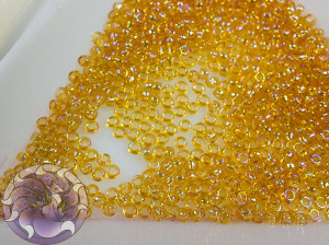5г Бісер TOHO круглий 15/0 Transparent-Rainbow Med Topaz TR-15-162B