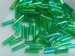 Стеклярус 6мм Miyuki Bugle Bead 5г Колір Transperent Green AB