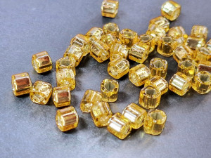 Бісер 5г TOHO Cube 4mm Silver Lined Med Topaz TC-04-22B