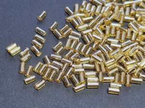 TOHO Стеклярус 5г - Bugle #1 (3mm) : Silver Lined Lt Topaz TB-01-22