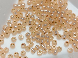 Бісер 5г TOHO Round 11/0 PermaFinish - Silver-Lined Milky Peach TR-11-PF2111 
