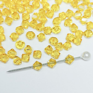 Кришталеві намистини Swarovski 5328, 4мм LIGHT TOPAZ, 10 шт