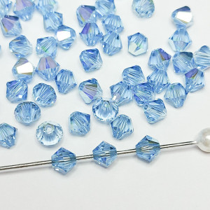 Кришталеві намистини Swarovski біконус 5328, 4мм AQUA AB, 10 шт