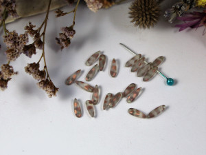Glass Daggers 11x3mm Crystal Capri Gold Dots Matted