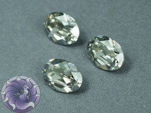 Кристал 4120 Swarovski Овал 14х10мм колір Black Diamond foiled