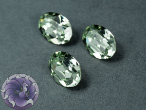 Кристал 4120 Swarovski Овал 14х10мм колір CHRYSOLITE foiled