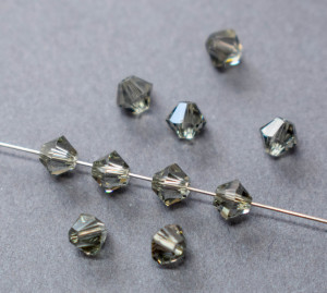 Кришталеві намистини Swarovski біконус 5328, 4мм Black Diamond