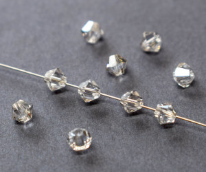 Кришталеві намистини Swarovski біконус 5328, 4мм Light Grey